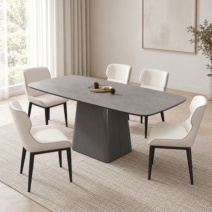 Cream PU leather dining chairs with black metal legs around a modern dining table