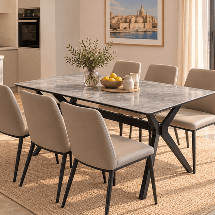 Modern grey sintered stone dining table with beige dining chairs in a bright contemporary interior