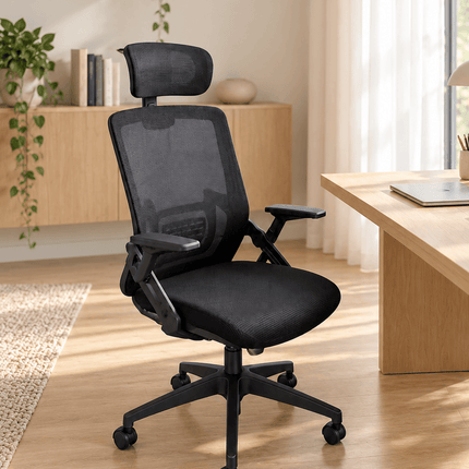 Black ergonomic mesh office chair with headrest, padded seat and armrests