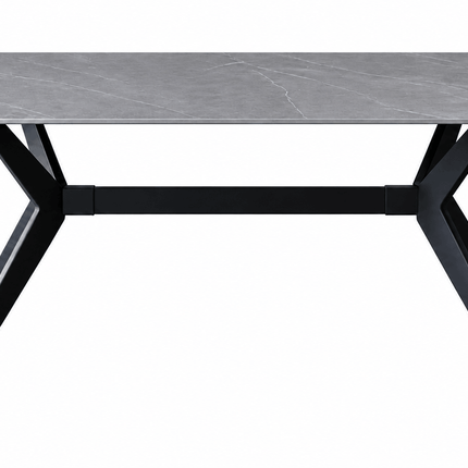 Grey rectangular sintered stone dining table with white veining and black X-shaped legs