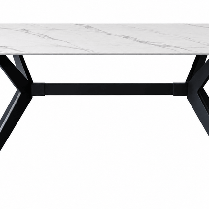 White sintered stone dining table with grey marble-effect veining and black angular metal legs on a white background