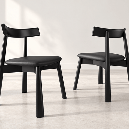 Front and rear views of black wooden dining chairs with upholstered seats