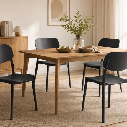 Black stackable plastic dining chairs