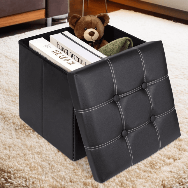 Black storage footstool with removable lid and hidden compartment for books and toys