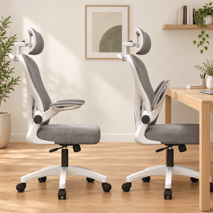 White and grey ergonomic office chair with adjustable headrest and flip-up armrests