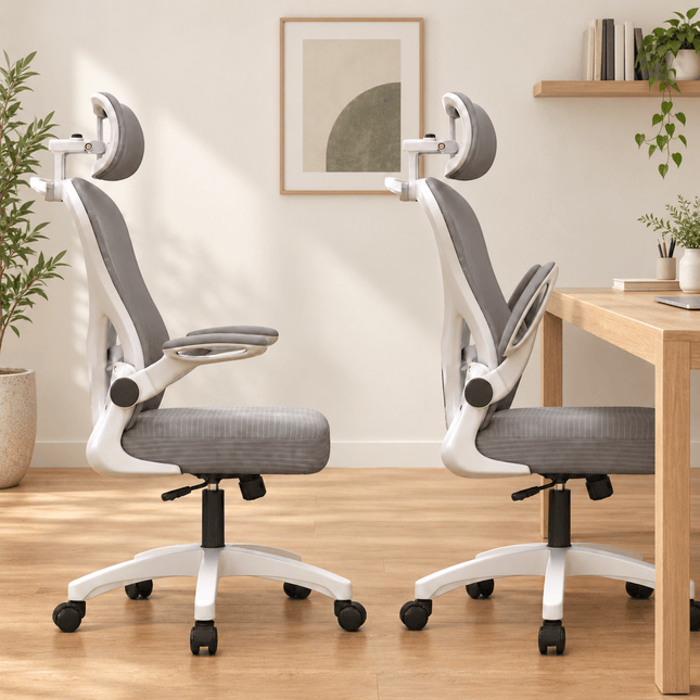 White and grey ergonomic office chair with adjustable headrest and flip-up armrests