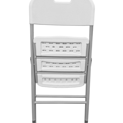 White folding chair in folded position for compact storage and portability
