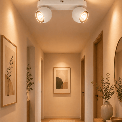 Modern matt white 2L ceiling spotlight installed in hallway interior
