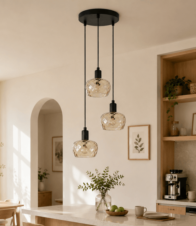 Modern 3-light glass cluster pendant light with amber glass shades in modern kitchen