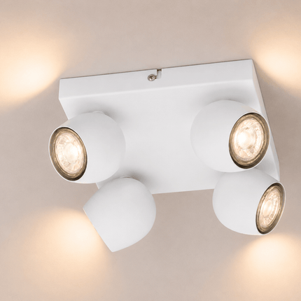 Modern 4L adjustable surface mounted ceiling spotlight in matt white finish with four directional GU10 LED lights