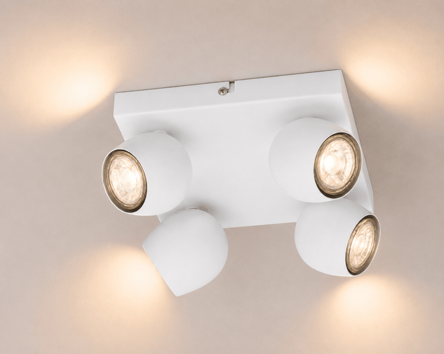 Modern 4L adjustable surface mounted ceiling spotlight in matt white finish with four directional GU10 LED lights