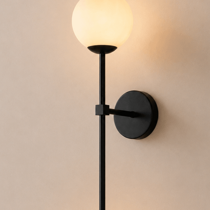 Modern black globe wall sconce with frosted glass shade