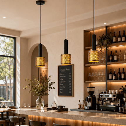 Modern black and gold pendant lights above café counter and bar area