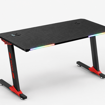 Black and red RGB gaming desk with carbon fiber texture desktop and LED lighting