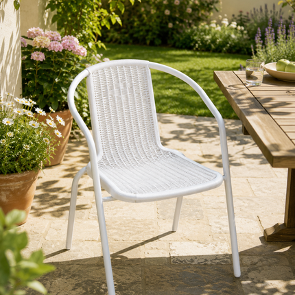 White stackable outdoor dining chair for patio and garden use