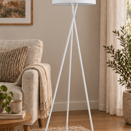 Modern white tripod floor lamp with fabric drum shade and foot switch