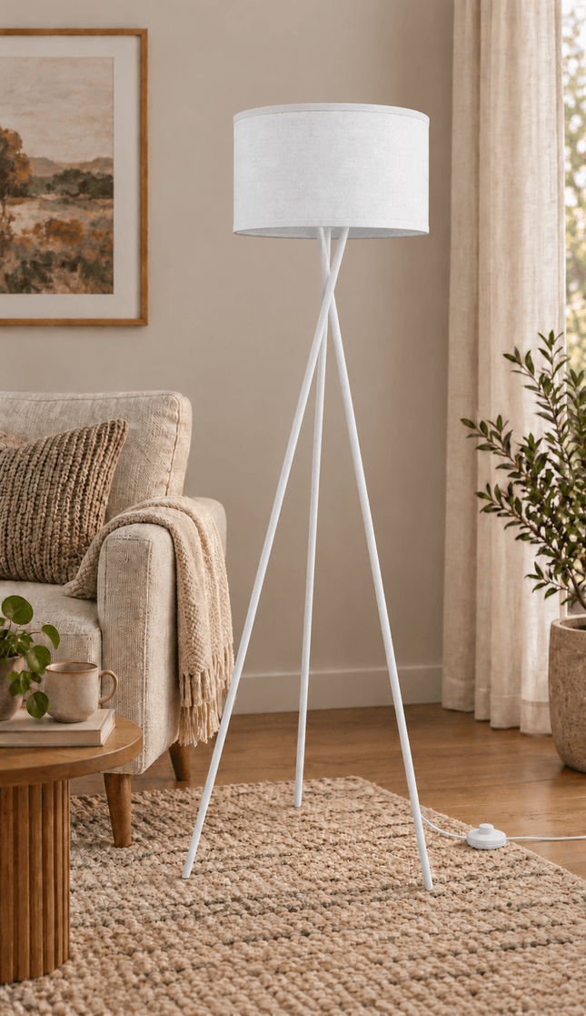 Modern white tripod floor lamp with fabric drum shade and foot switch